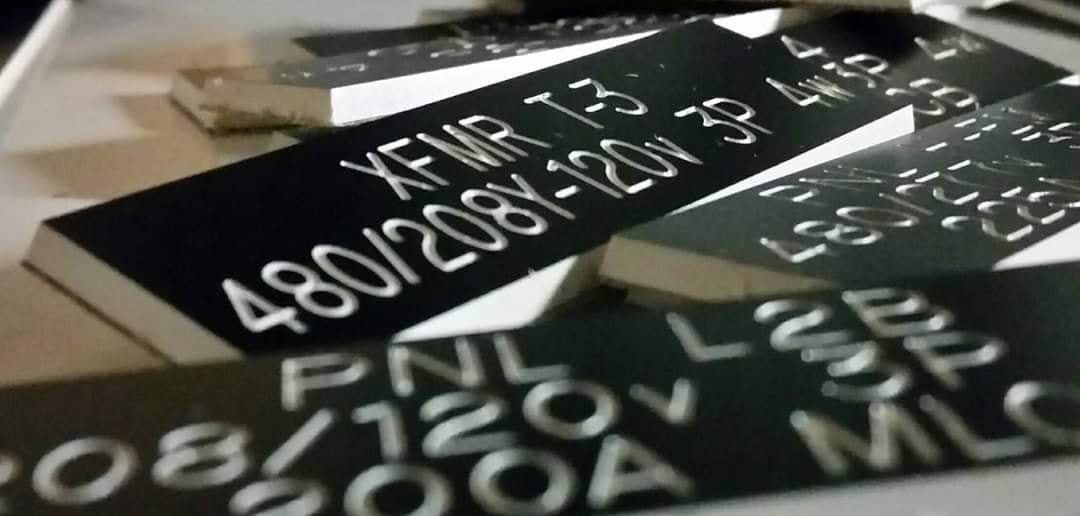 Engraved black phenolic nameplates — XFMR T3 480/208Y-120V 3P, PNL L2B 120V, MLC