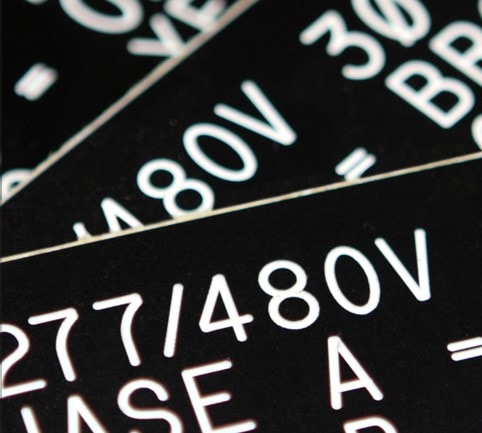 Phenolic plastic electrical warning labels